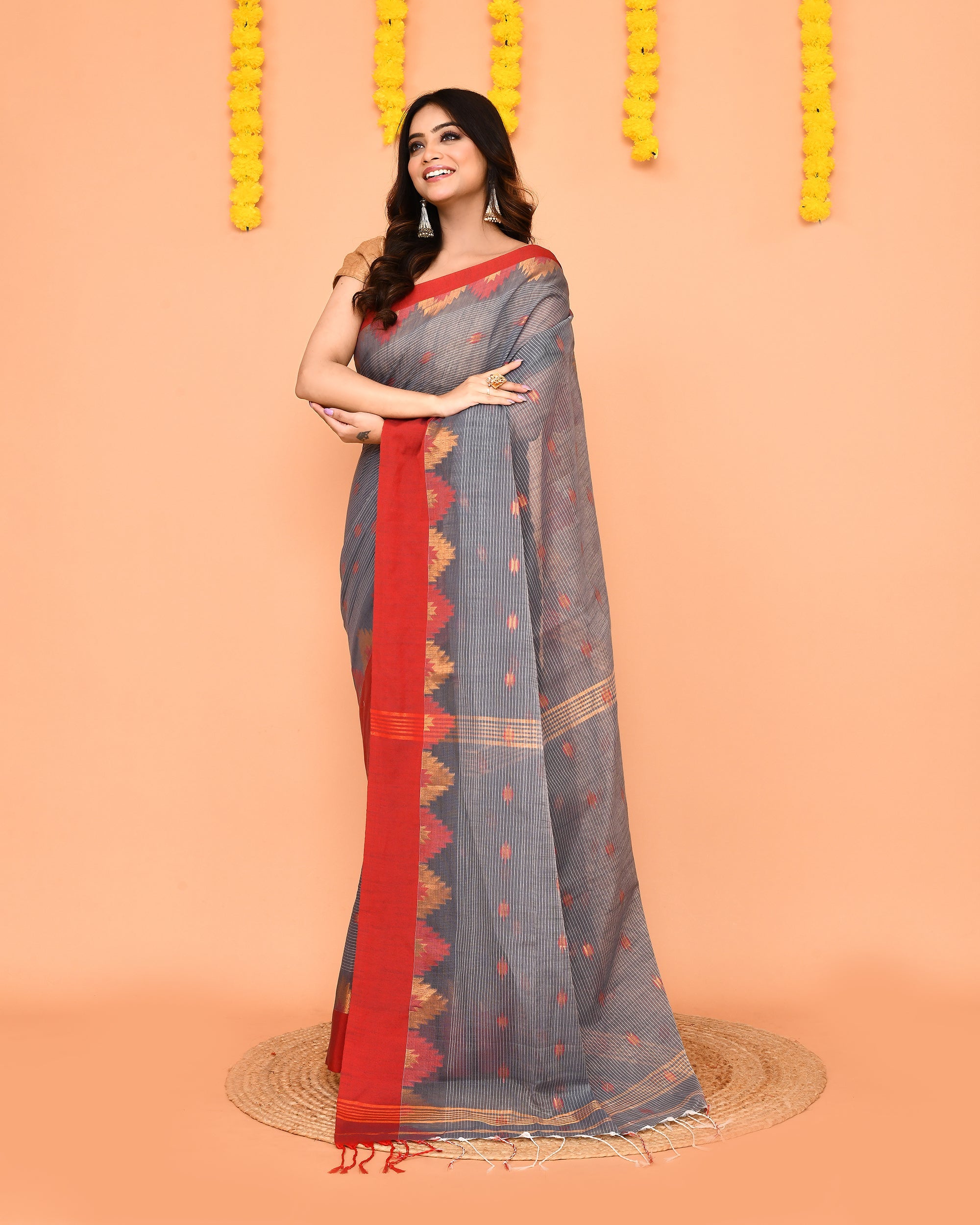 Grey Handloom Cotton Blend Saree with a traditional red temple border