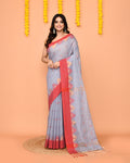 Sky blue cotton blend saree featuring a contrasting red temple border