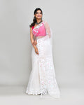 Elegant white art silk Jamdani saree with intricate hand work and matching blouse piece