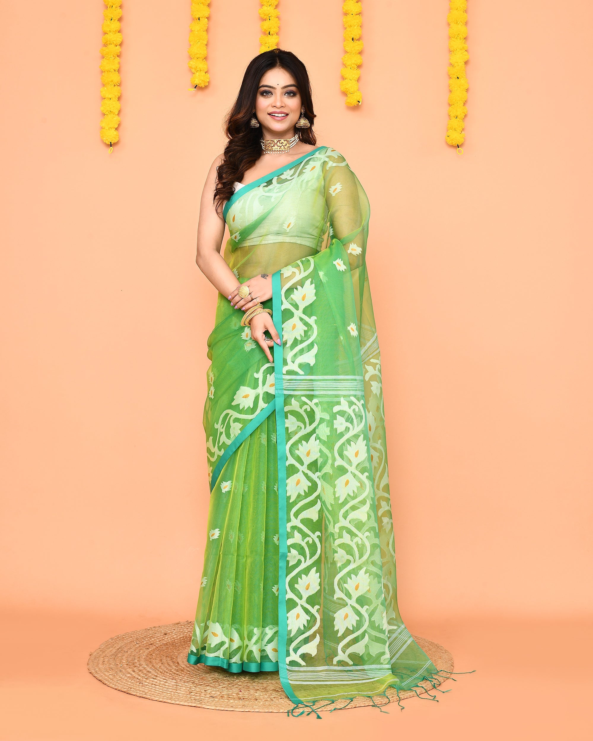 Green Resham silk Jamdani saree with contrasting red border