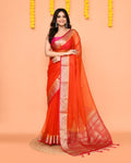 Orange organza silk saree with shimmering Zari border