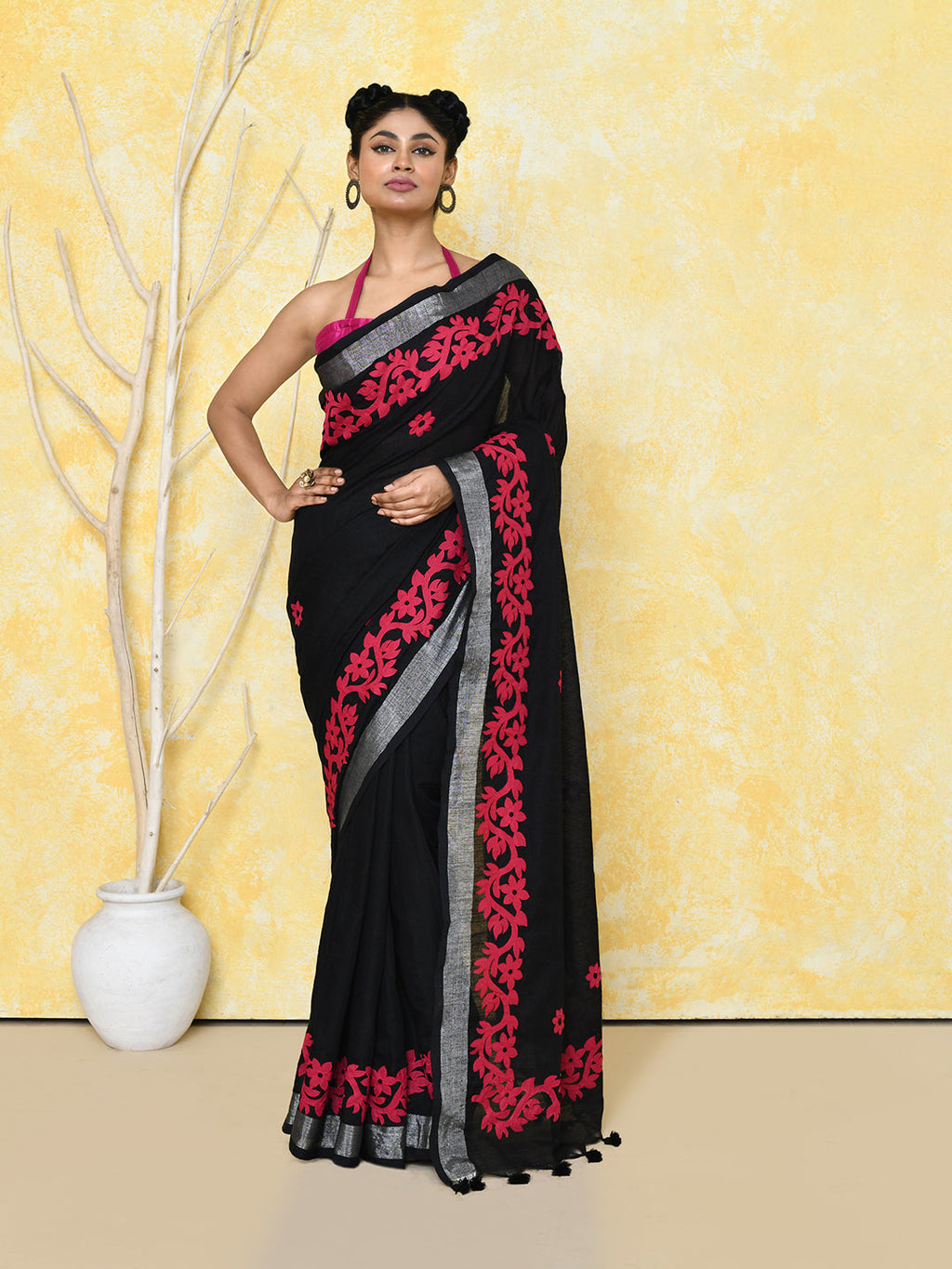 Black applique saree in handspun cotton with included blouse piece.