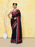 Black applique saree in handspun cotton with included blouse piece.