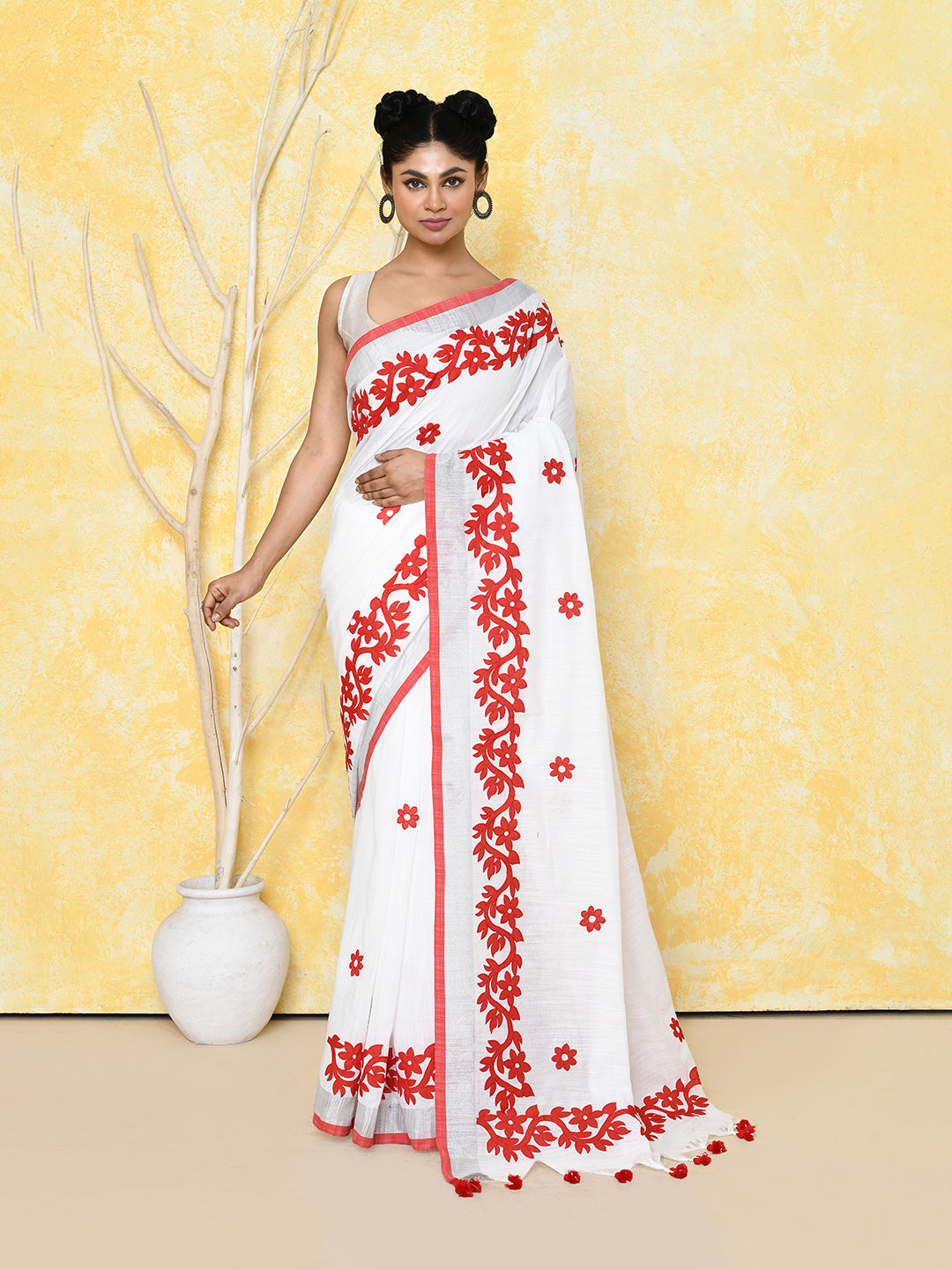 White exclusive applique saree with matching blouse piece