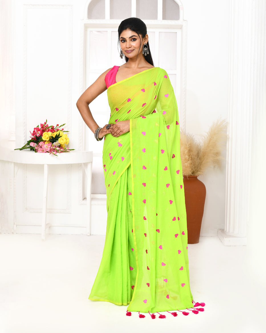Lemon green cotton saree featuring detailed exclusive embroidery.