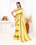 A multi-colored striped mulmul cotton saree with detailed tassel edges draped elegantly.