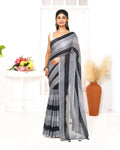 Grey and black striped mulmul cotton saree with decorative tassels on pallu