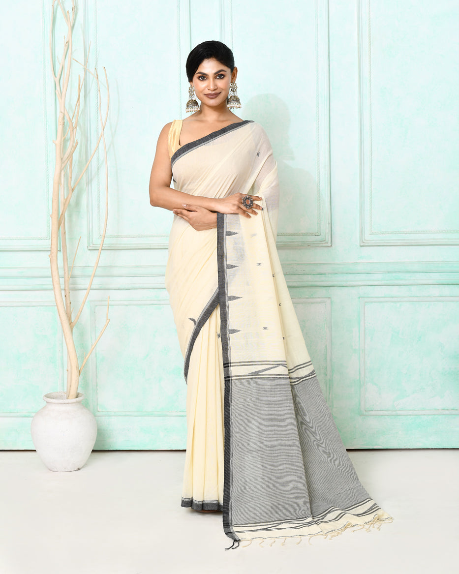 Off white cotton handloom Jamdani saree with intricate weaving and matching blouse