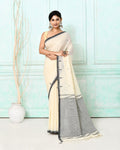 Off white cotton handloom Jamdani saree with intricate weaving and matching blouse