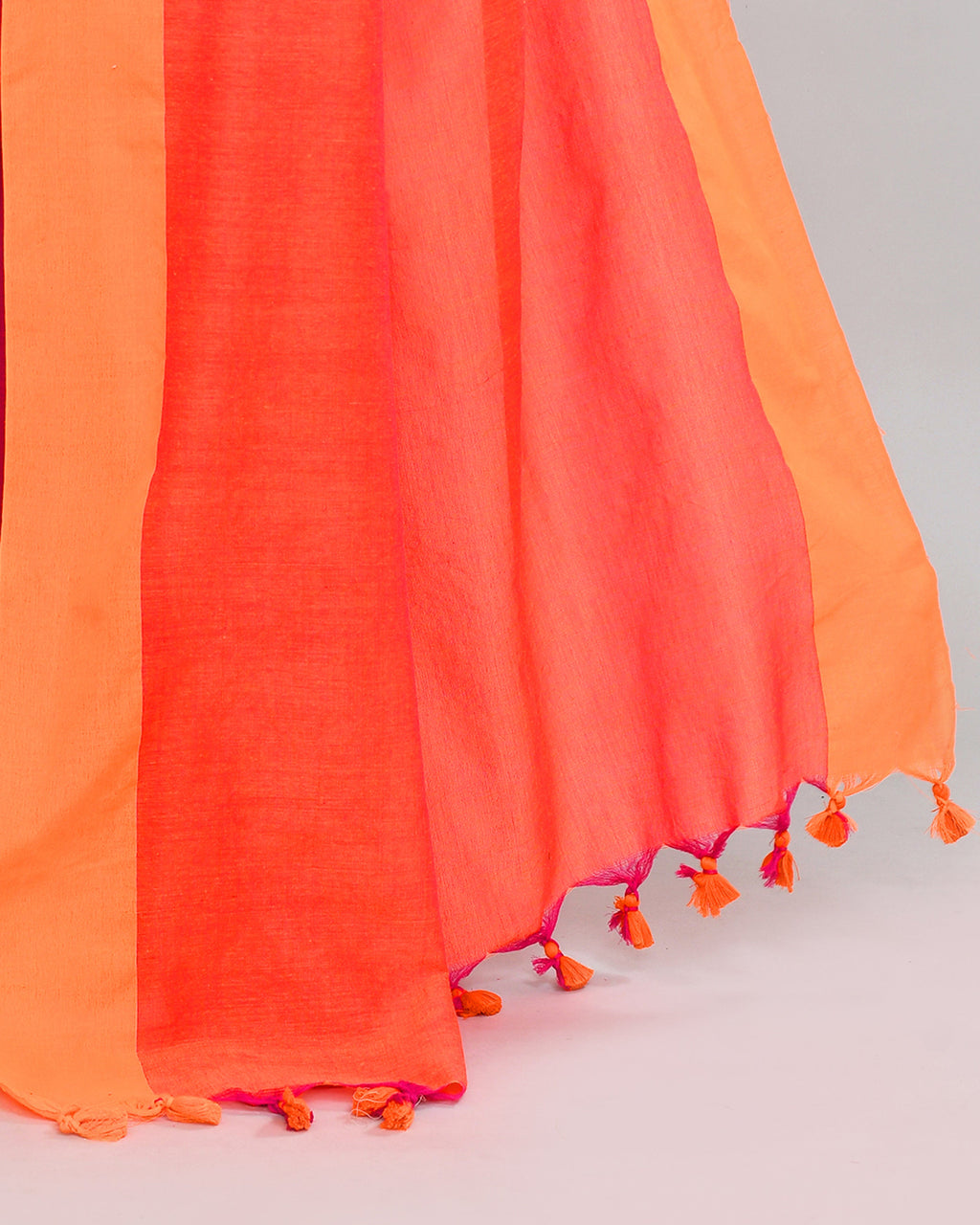 Rani Pink Cotton Saree with Orange Border and Tassel Detail