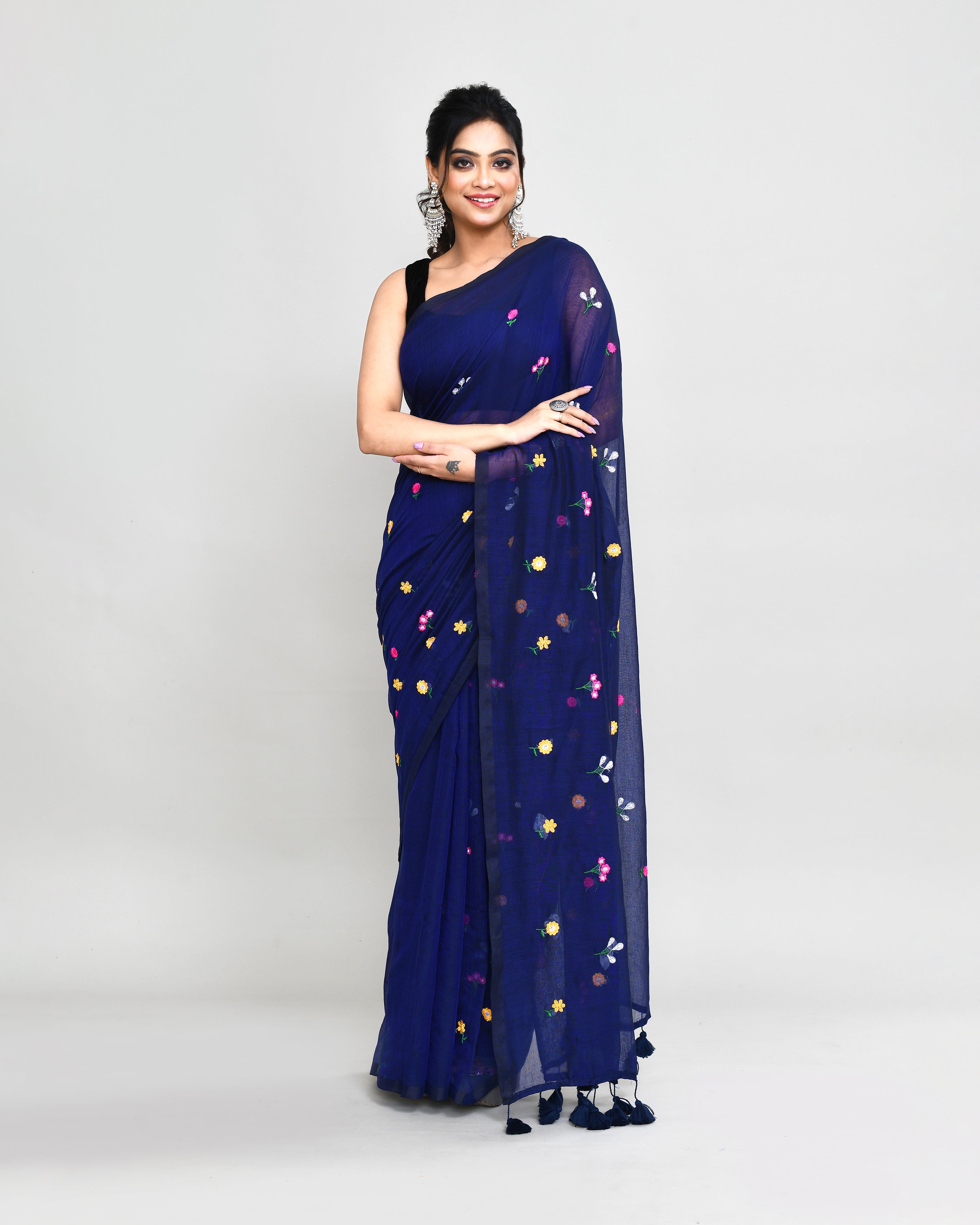 Blue embroidered cotton saree with decorative tassel details
