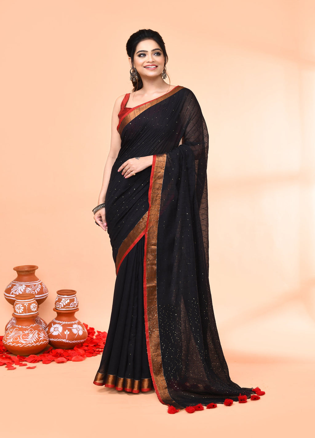Black cotton handloom saree with delicate sequin embellishments and matching blouse