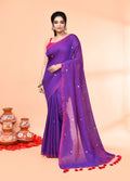Purple cotton handloom saree with detailed sequin embroidery and matching blouse.