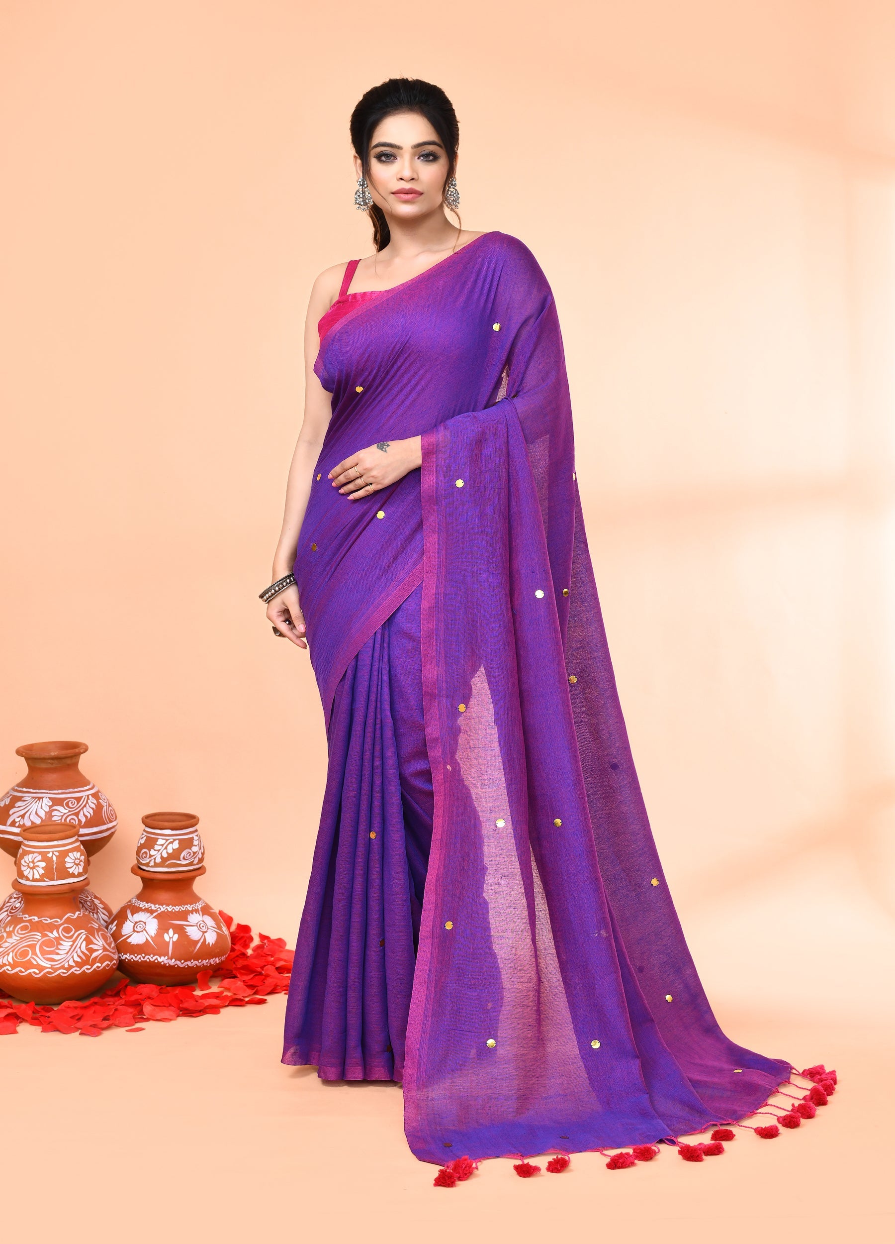 Purple cotton handloom saree with detailed sequin embroidery and matching blouse.