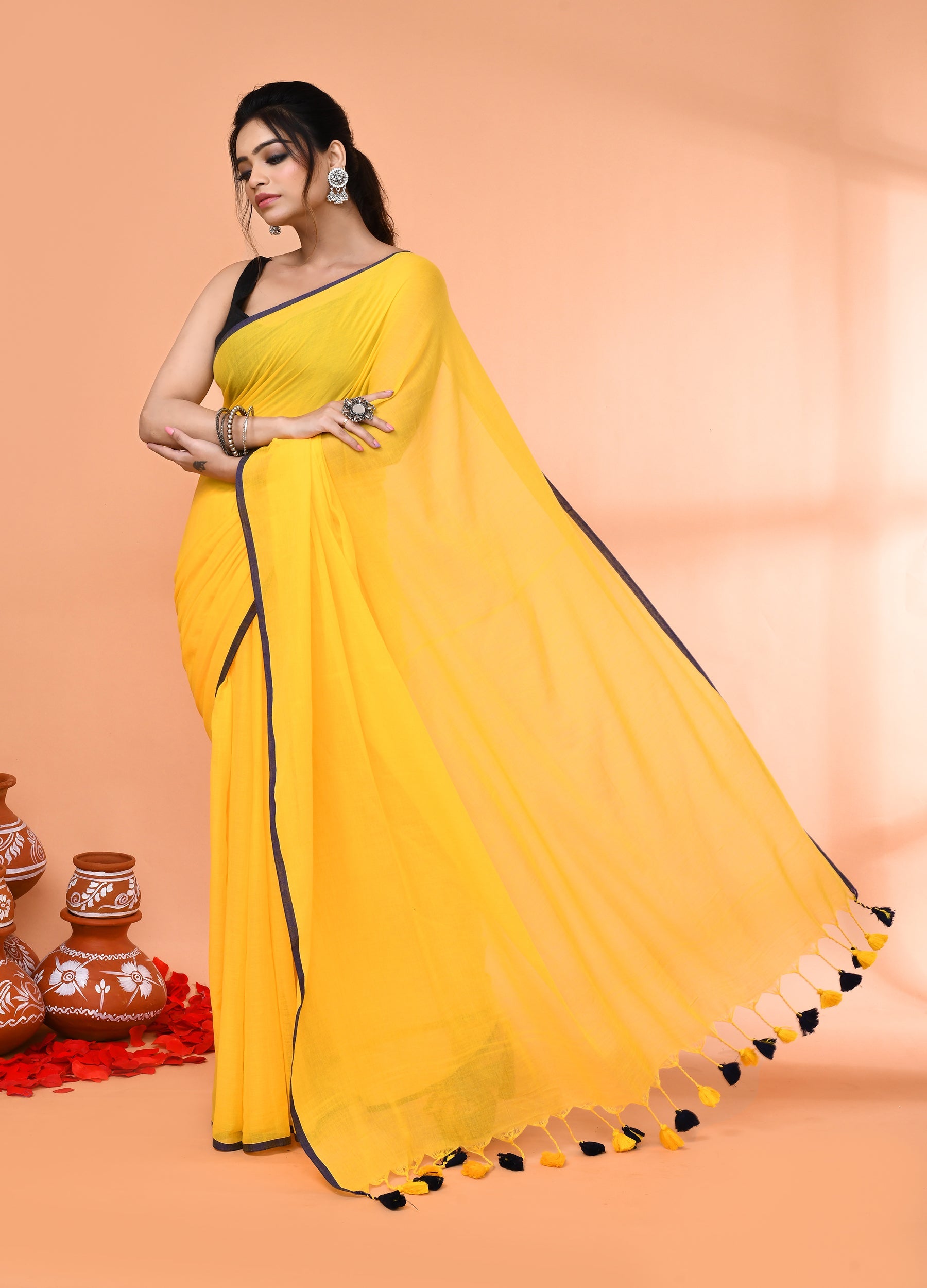 Yellow Mulmul Cotton Saree with Tassels for Festive Occasions