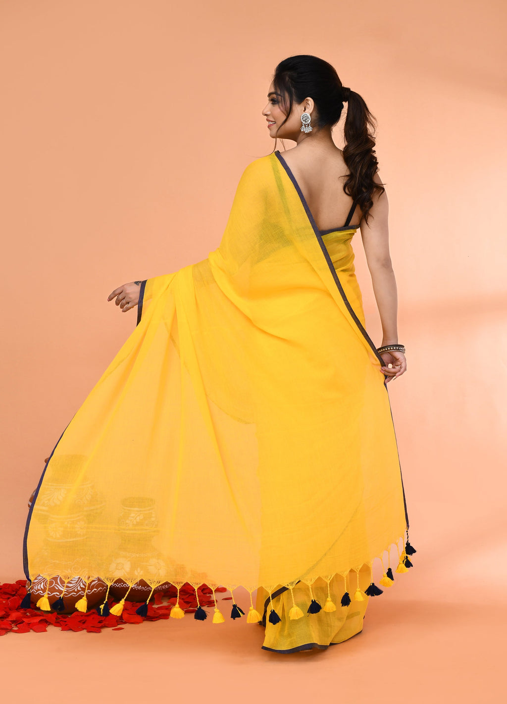 Yellow Mulmul Cotton Saree with Tassels for Festive Occasions