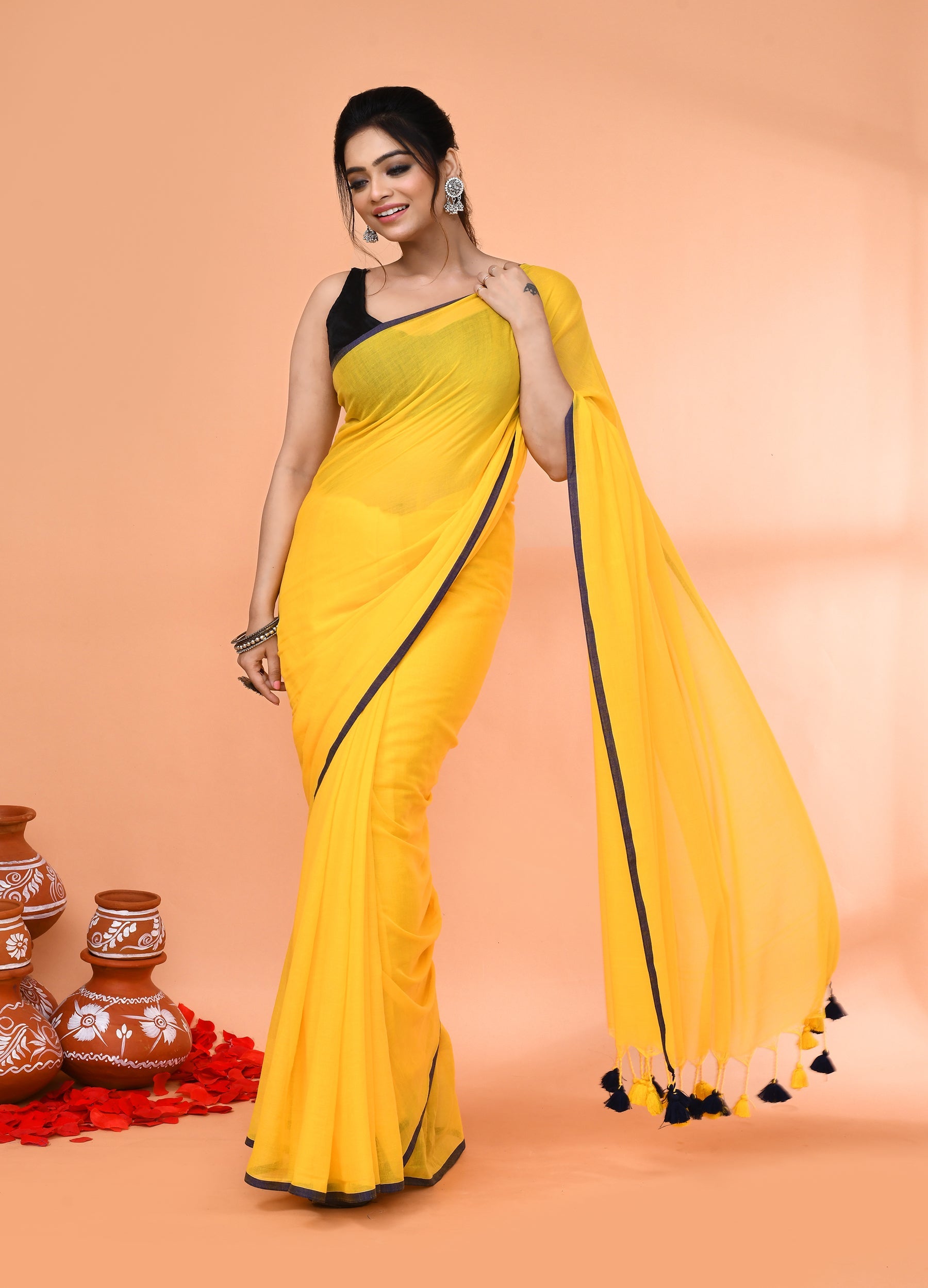 Yellow Mulmul Cotton Saree with Tassels for Festive Occasions