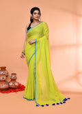 Lemon Green Mulmul Cotton Saree featuring soft fabric and decorative tassels