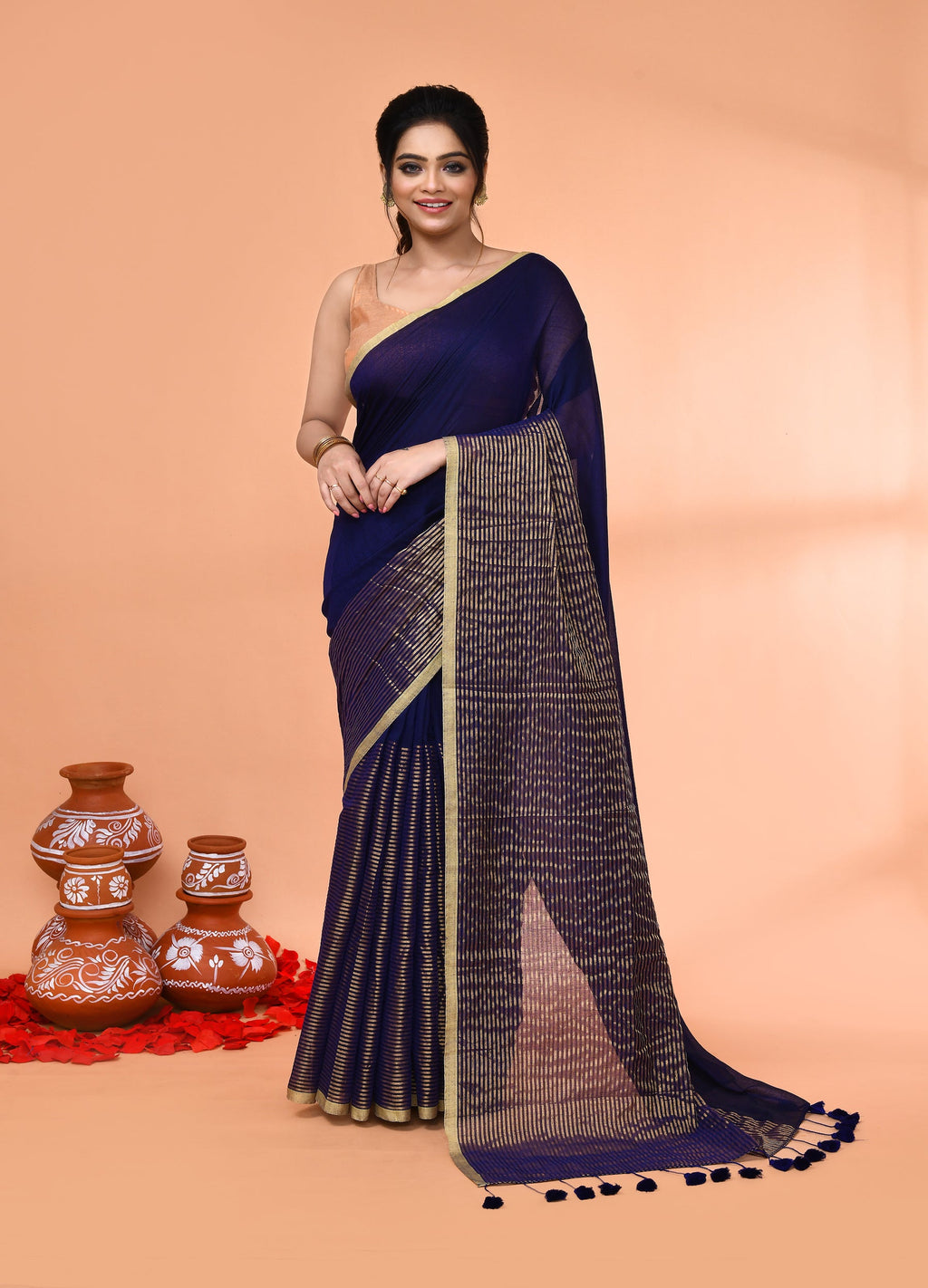 Deep blue cotton handloom saree with gold zari stripe detailing