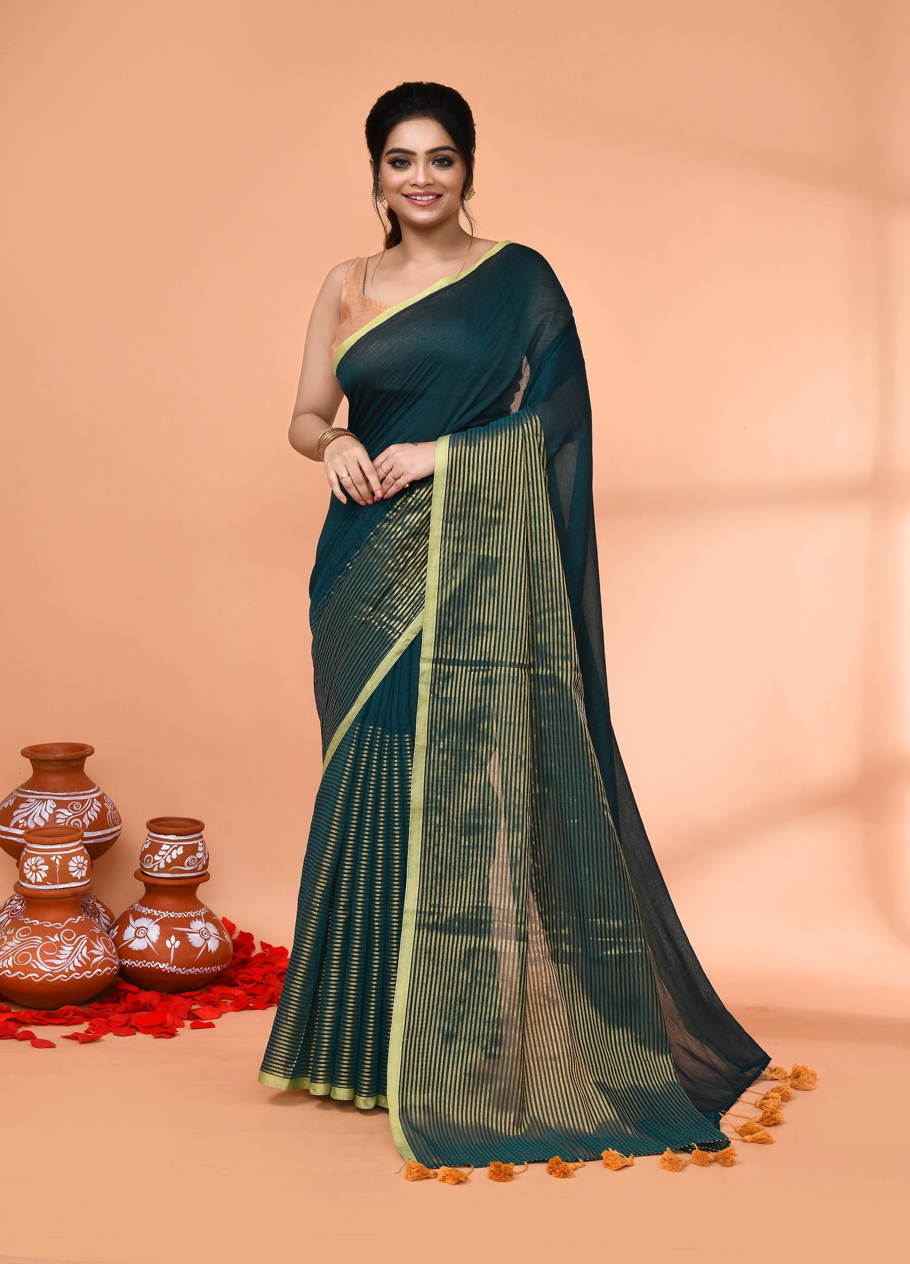 Vibrant teal cotton handloom saree with gold zari stripes
