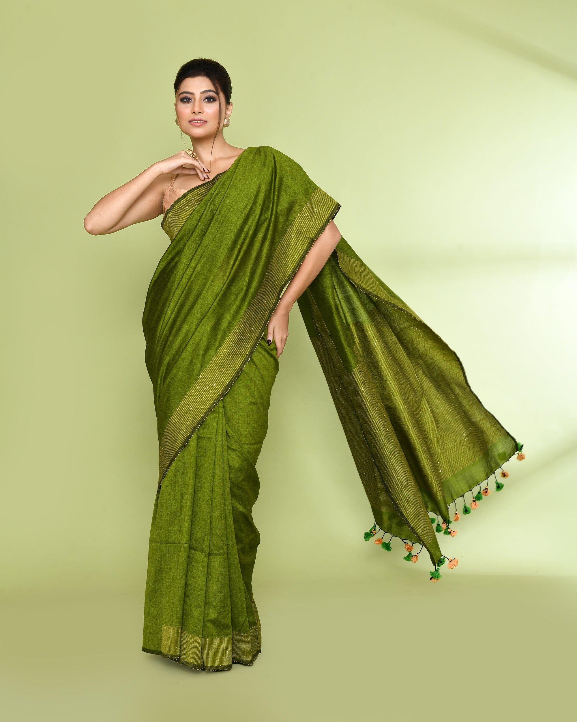 Apple green cotton saree with delicate sequin embellishments