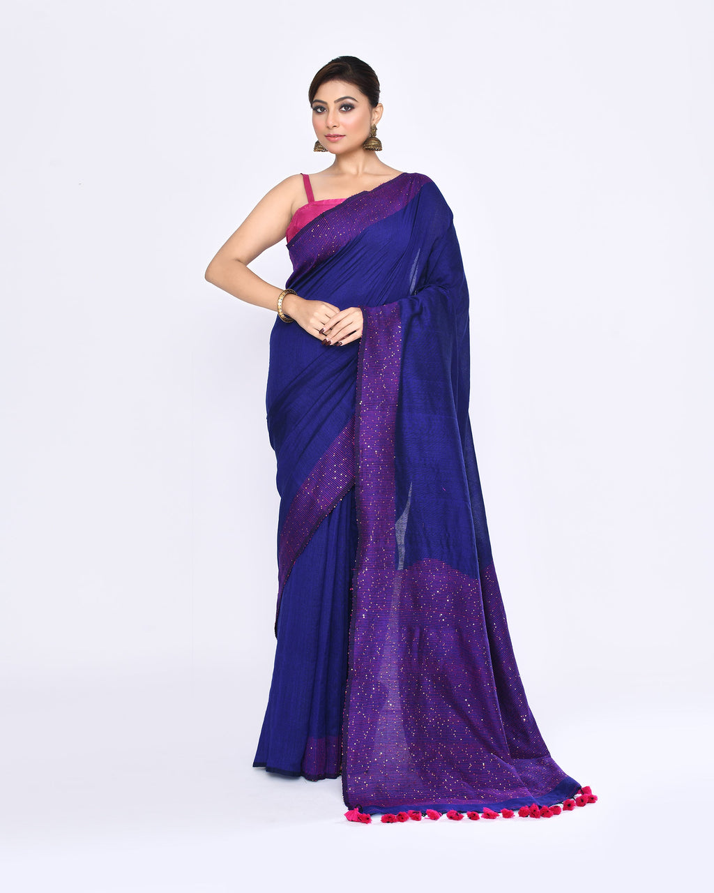 Bright blue cotton saree with delicate sequin embellishments