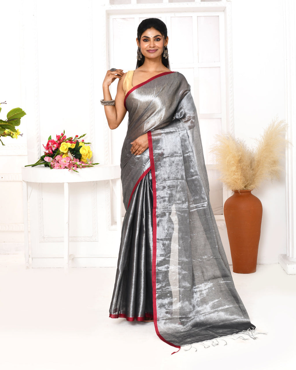 Shimmering silver grey dual-tone organic tissue saree.