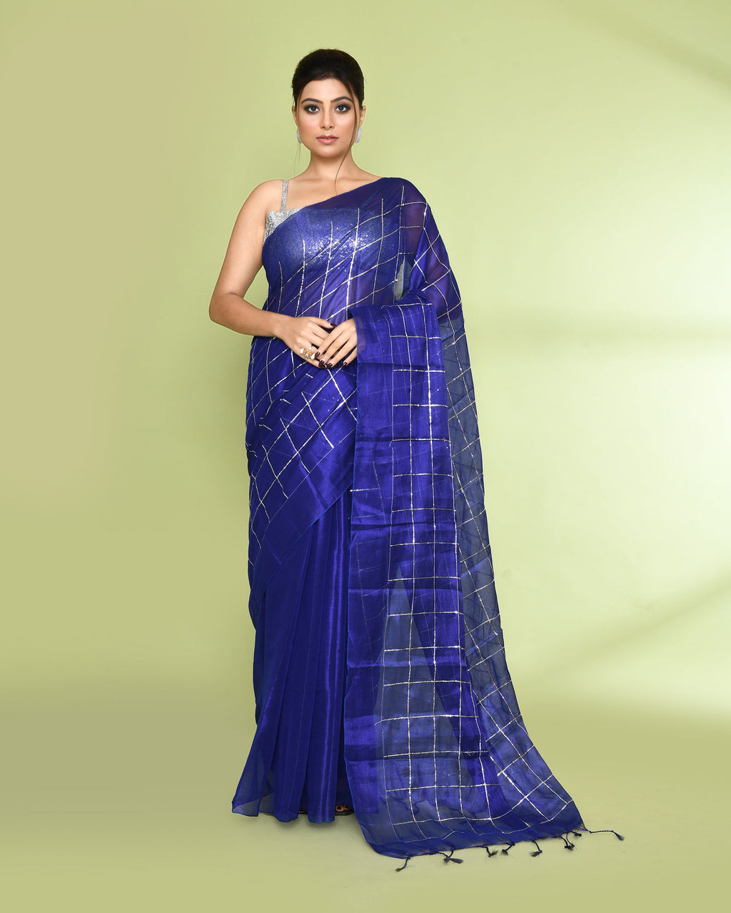 Blue Zari cotton tissue saree with delicate sequin embellishments and vibrant borders