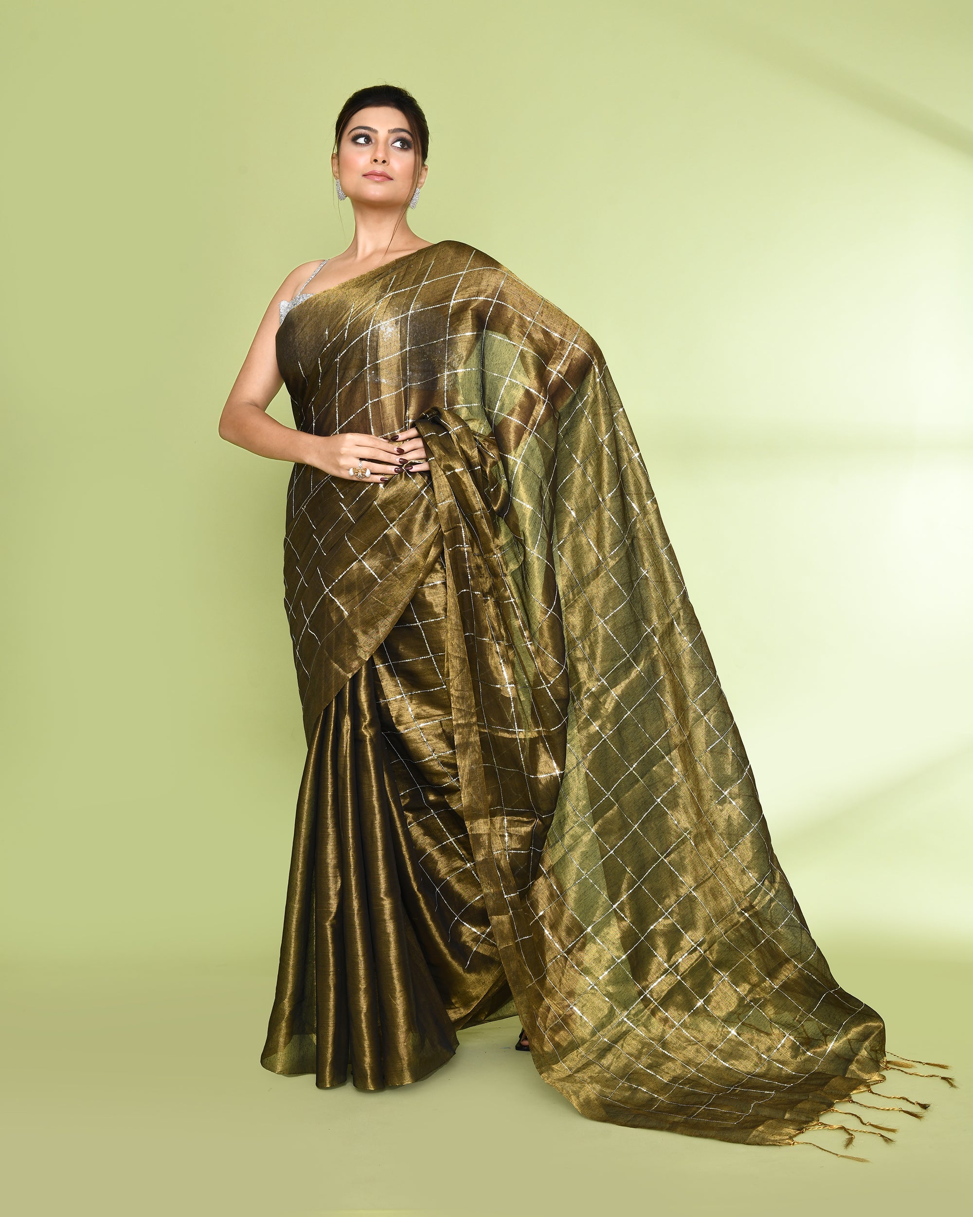 Golden dual-tone cotton tissue saree with sequin embellishments and zari work