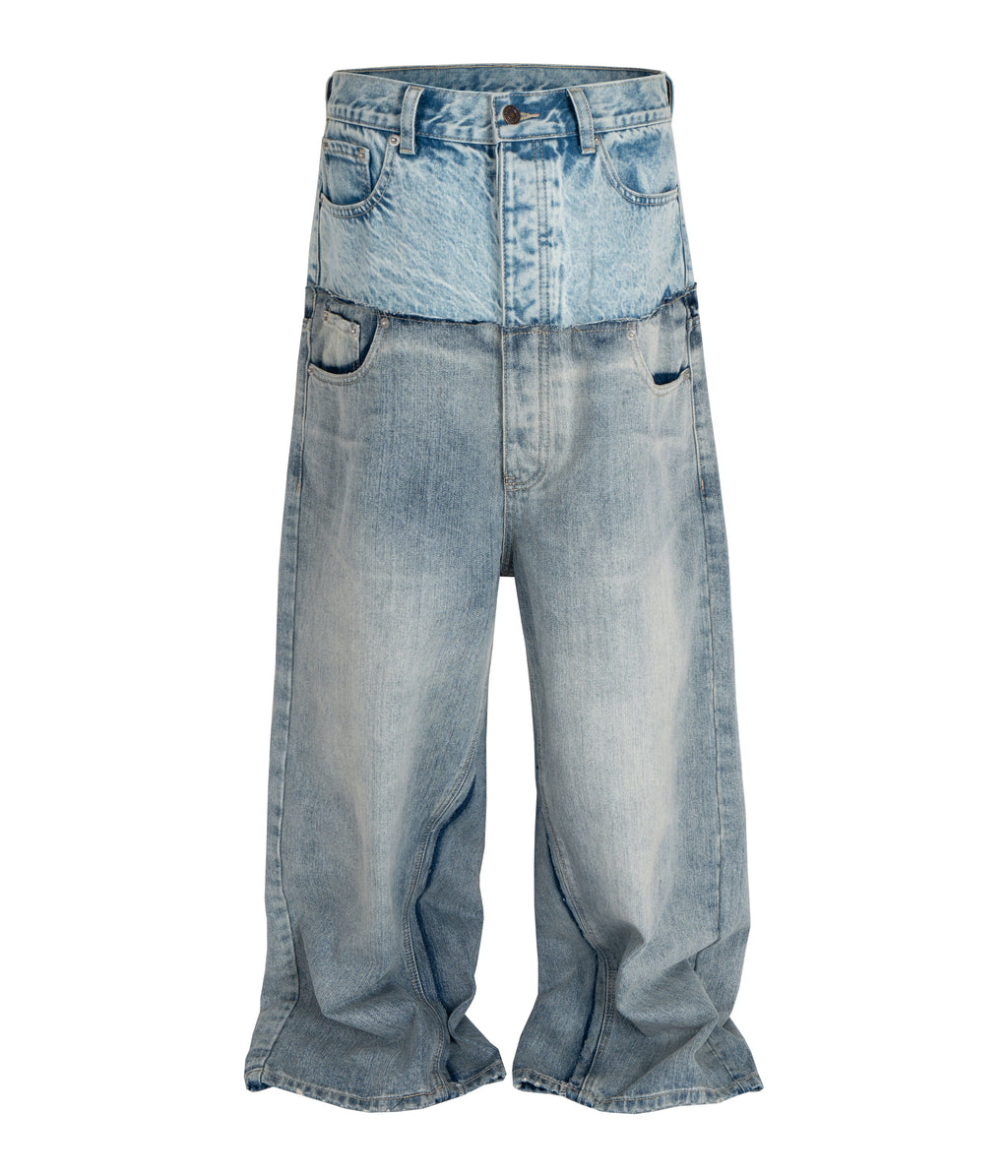 Front view of Wideboy Double Denim baggy fit jeans in light blue wash featuring double-layer contrast panels.