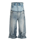 Front view of Wideboy Double Denim baggy fit jeans in light blue wash featuring double-layer contrast panels.