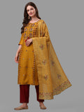 Model wearing a mustard rayon kurta set with multicolor embroidery, matching pants, and a dupatta.