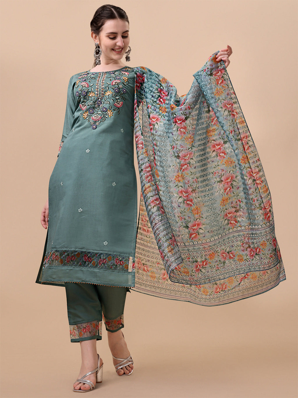 Woman wearing a multicolor embroidered rayon kurta set with matching pants and a printed dupatta