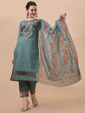 Woman wearing a multicolor embroidered rayon kurta set with matching pants and a printed dupatta