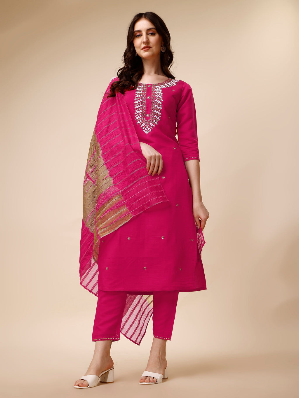 Multicolor hand-embroidered rayon kurta set with matching pants and dupatta.