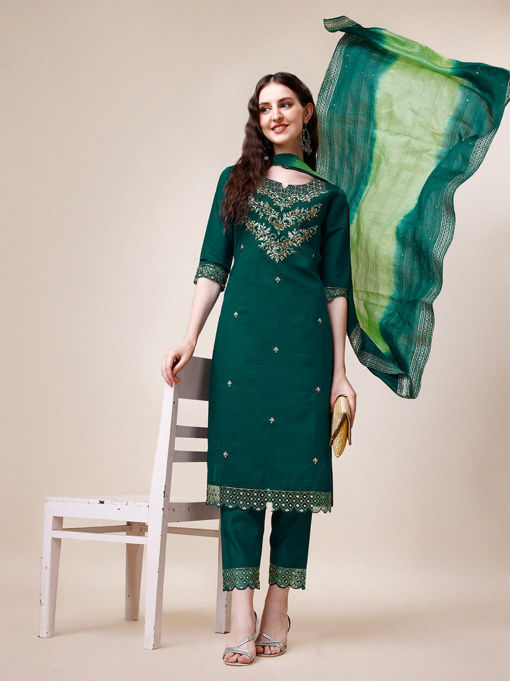 Woman wearing a multicolor hand embroidered Chanderi kurta set with matching pant and dupatta