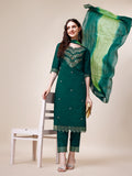 Woman wearing a multicolor hand embroidered Chanderi kurta set with matching pant and dupatta