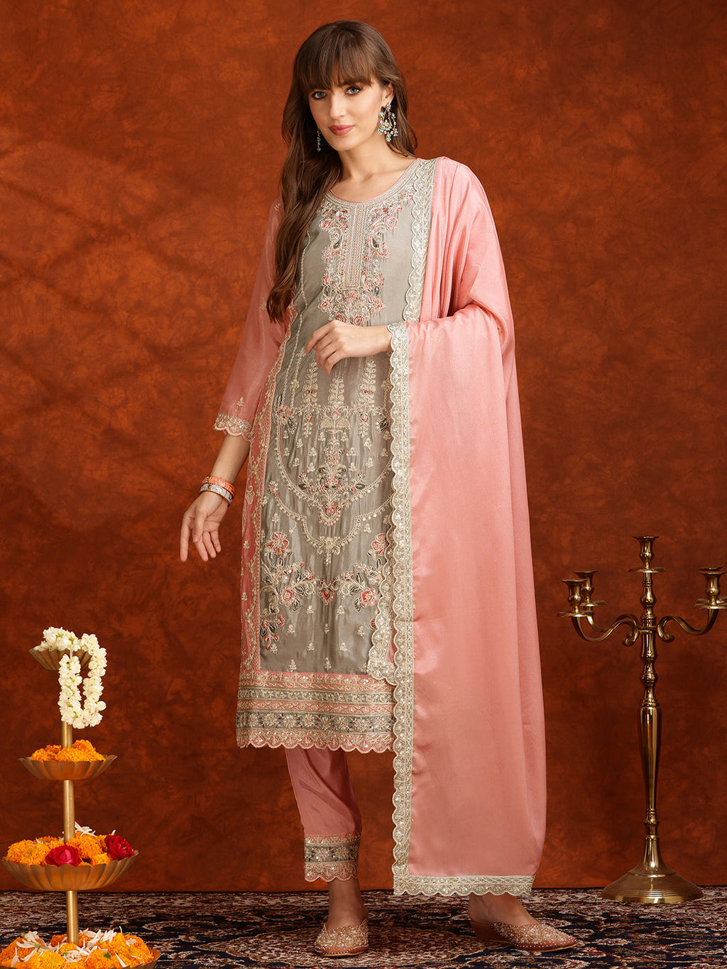 Pink Pakistani style silk kurta set with intricate embroidery and matching dupatta