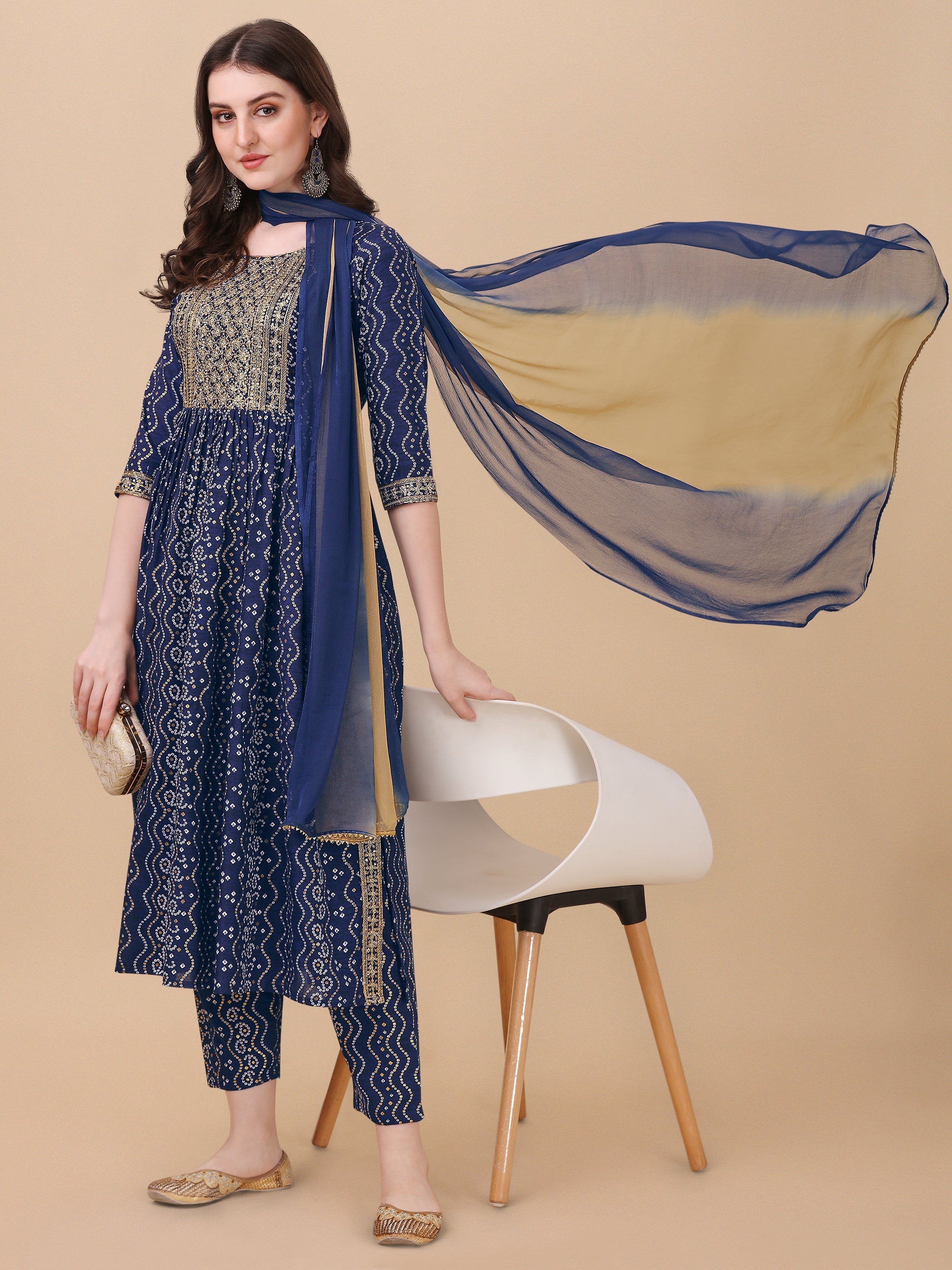 Multicolor Nayra cut kurta set with Bandhani print and embroidery, including matching pants and dupatta.