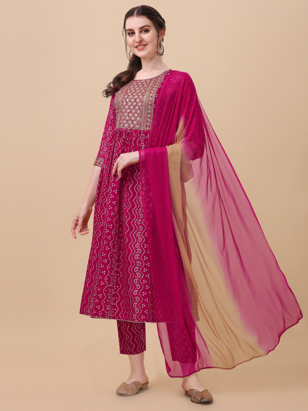 Pink Nayra cut Bandhani printed kurta with matching pants and dupatta featuring embroidery