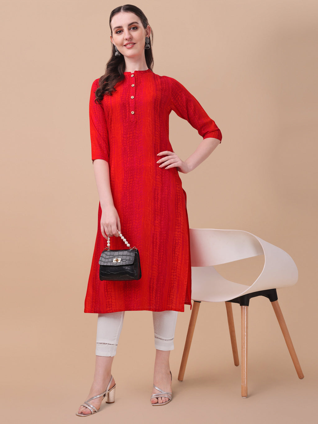 Multicolor Shibori printed rayon kurta with front button closure and 3/4th sleeves.
