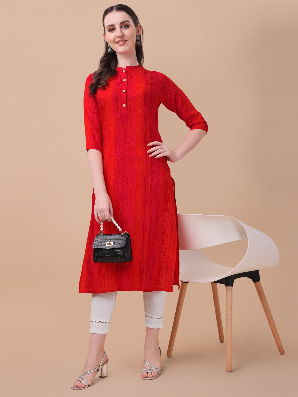 Multicolor Shibori printed rayon kurta with front button closure and 3/4th sleeves.