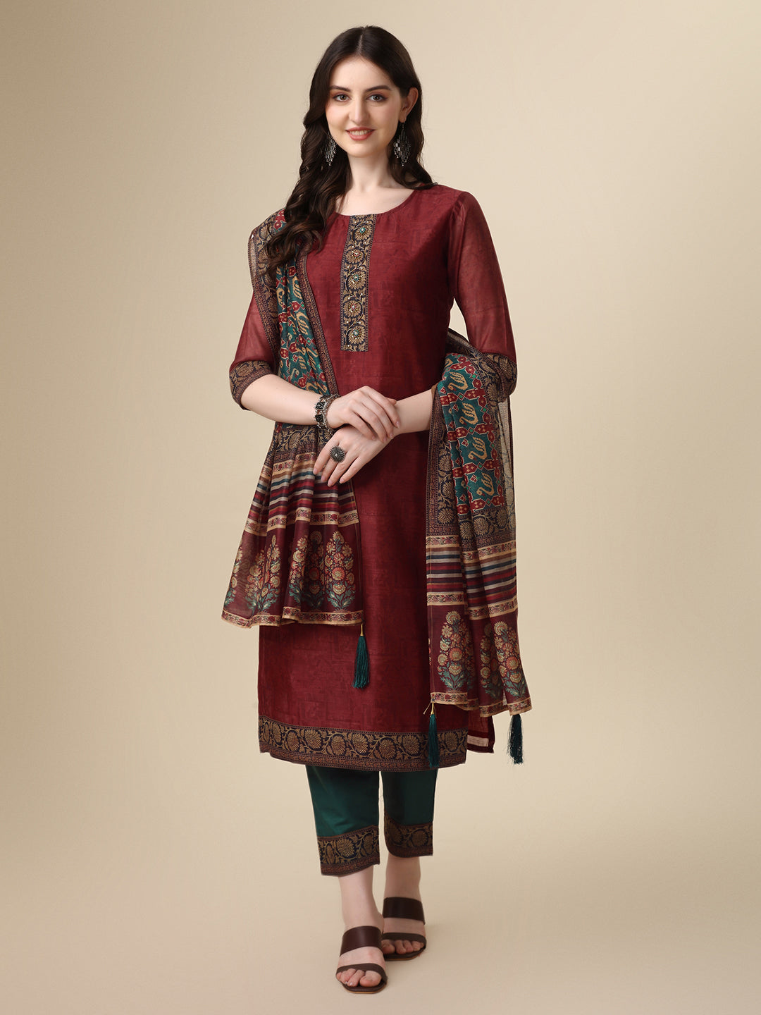 Front view of a multicolor printed and hand-embroidered rayon kurta set with matching bottoms.