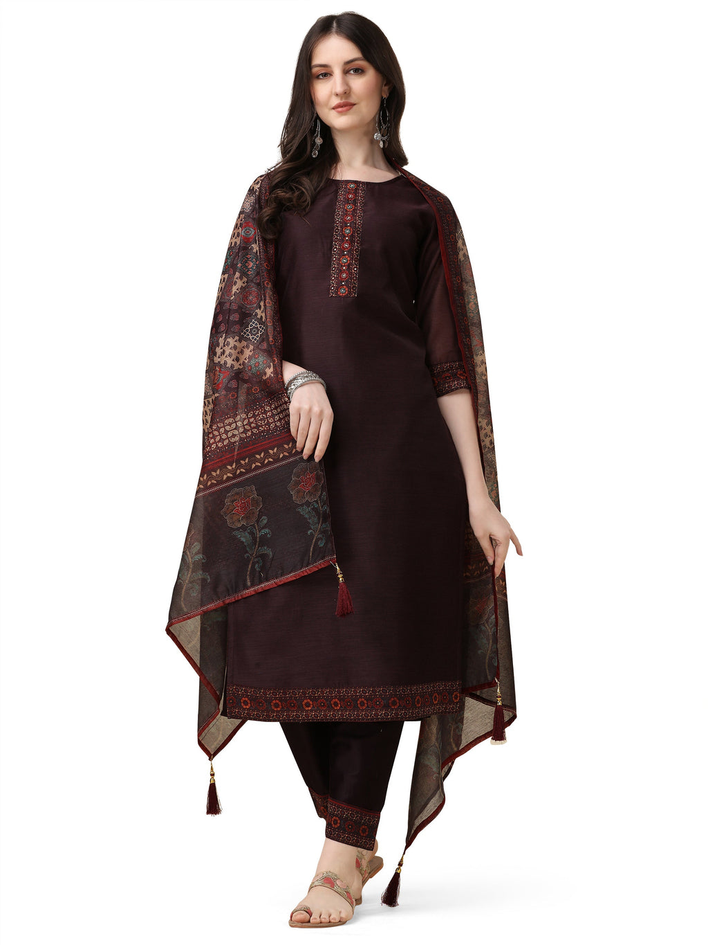 A woman wearing a multicolor hand embroidered rayon kurta set with pant and matching dupatta