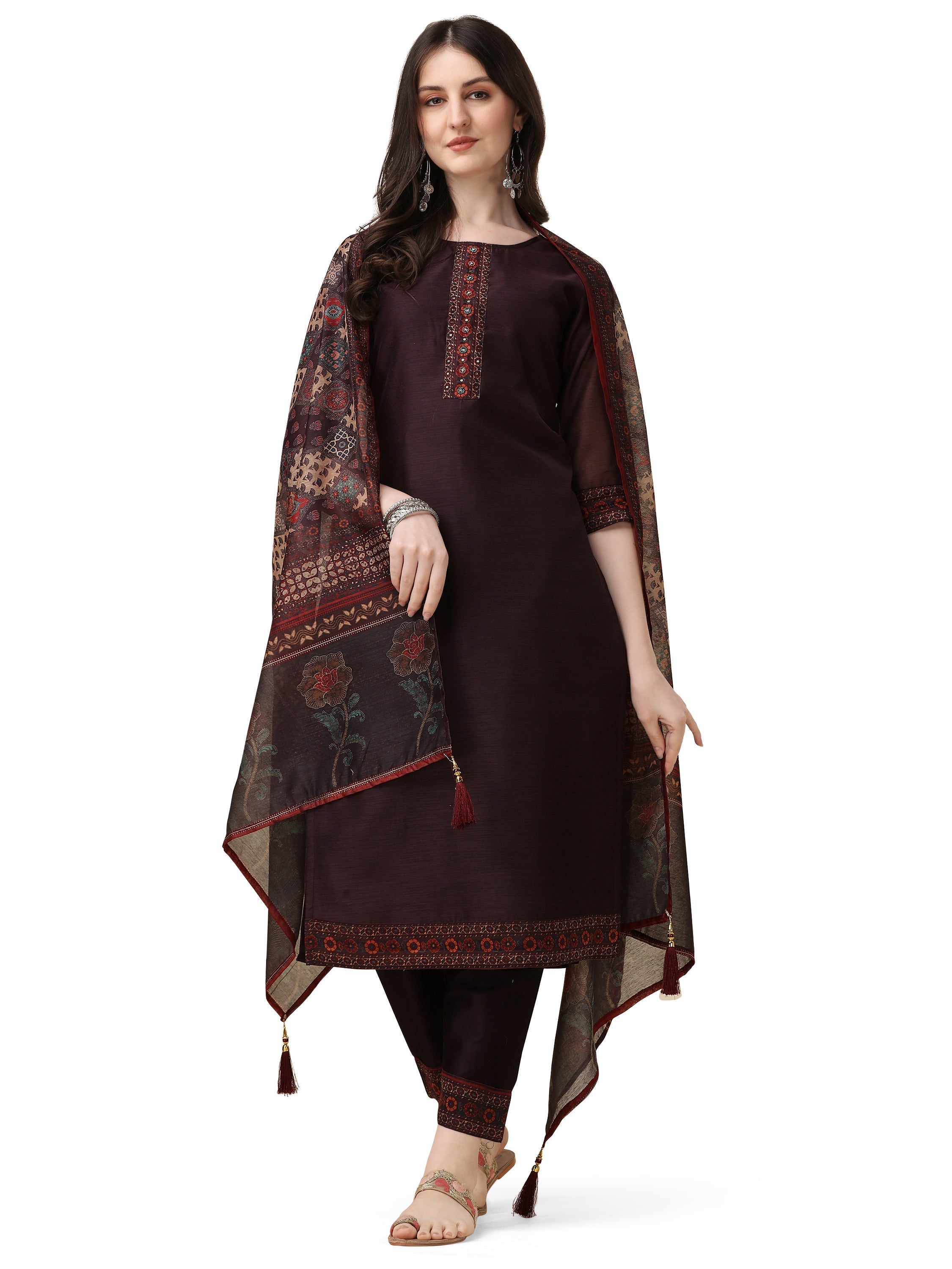 A woman wearing a multicolor hand embroidered rayon kurta set with pant and matching dupatta