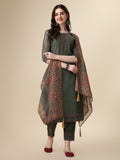 Woman wearing a multicolor printed rayon kurta with hand embroidery, matching pants, and a printed dupatta