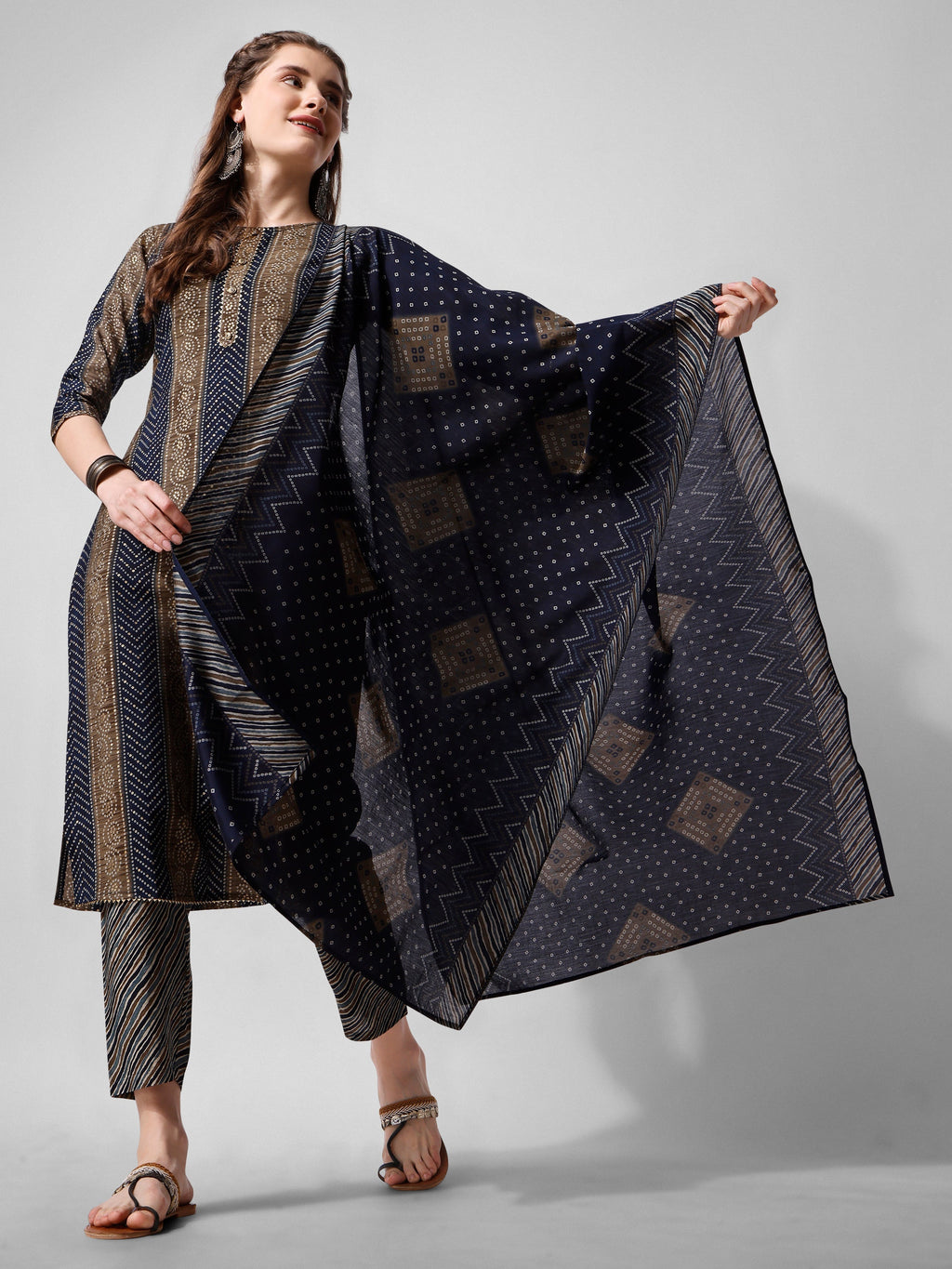 Woman wearing a multicolor printed rayon kurta set with matching pants and dupatta