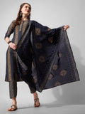 Woman wearing a multicolor printed rayon kurta set with matching pants and dupatta