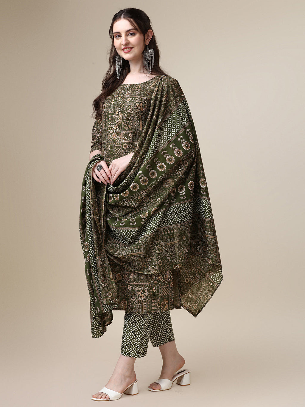 Woman wearing a multicolor printed rayon kurta set with coordinating pants and a matching dupatta