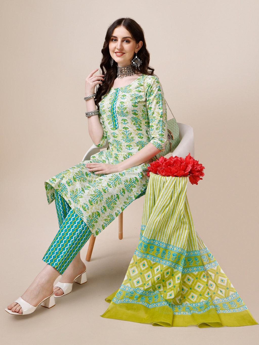 Multicolor block printed rayon kurta set with matching pants and dupatta.